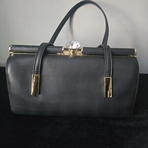 Elegant Black Handbag with Gold Accents
